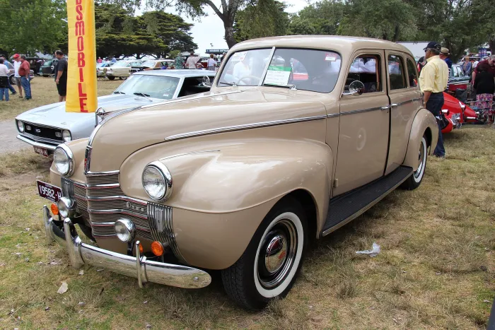 A dark blue 1940 Oldsmobile Dynamic Series 70 sedan